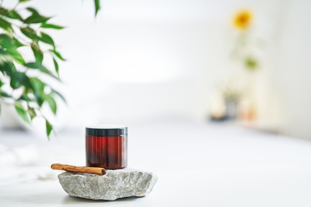 Set of oil and wooden stick on rock for massage