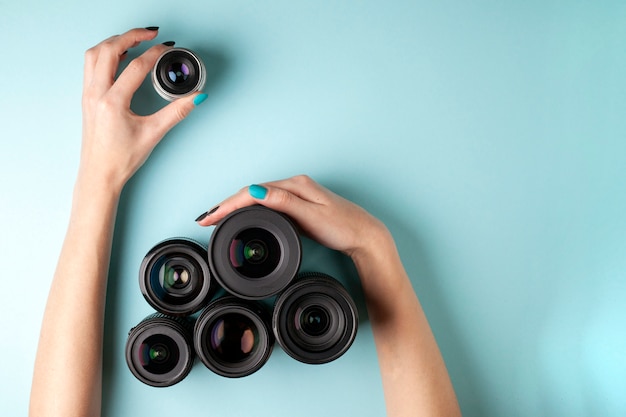 Set of photo lenses on a blue background