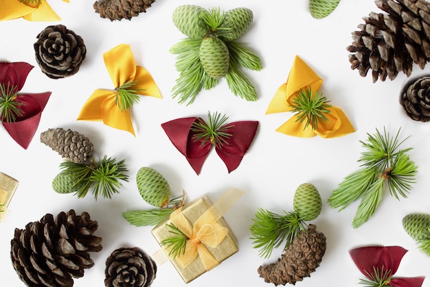 Set of pine cones and christmas decoration isolated on a white background christmas compositionflat lay top view