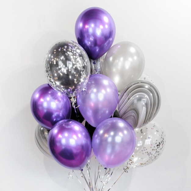 A set of purple and silver balls for your birthday