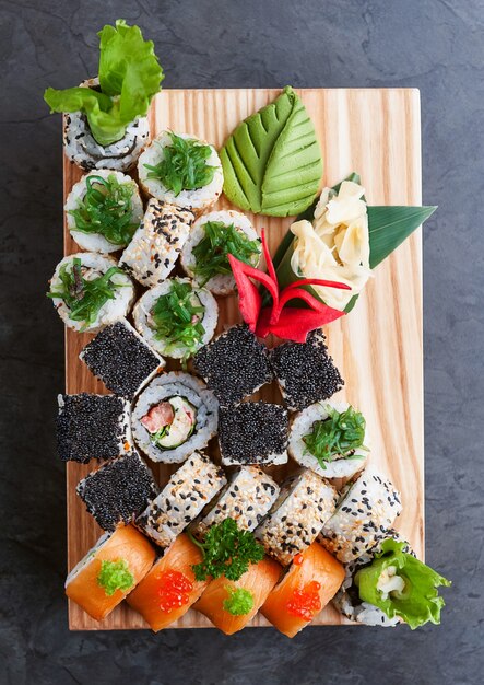 Set of real classic Japanese sushi. on a wooden surface