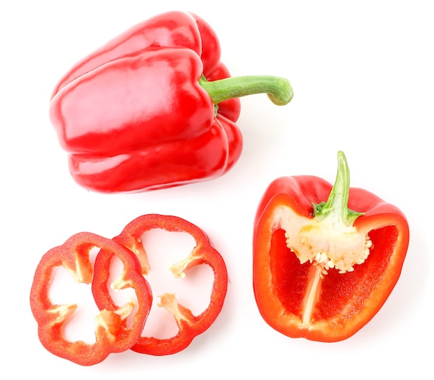 Set of red bell peppers whole, half, rings close-up on a white background, isolated. The view from top