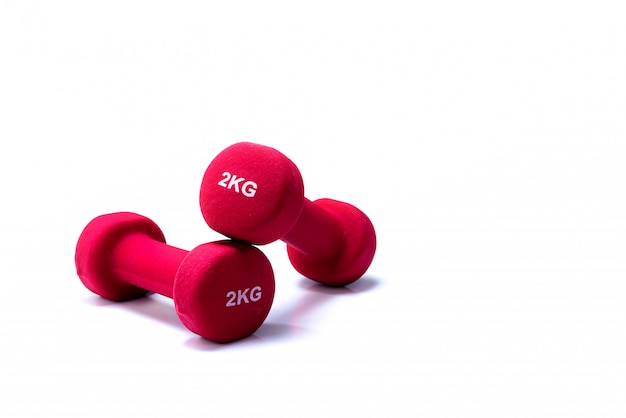 Set of red dumbbells isolated  Weight training equipment