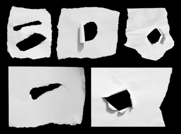 Set of ripped paper isolated on black background