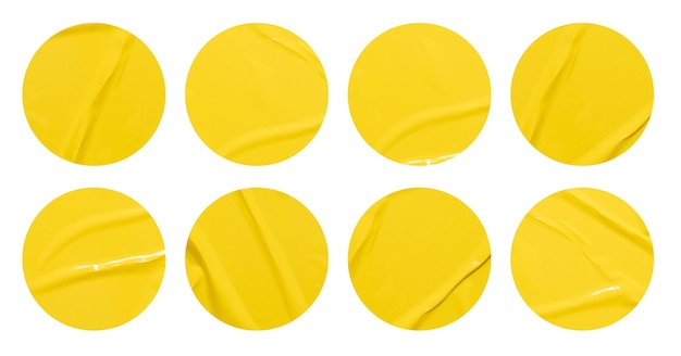 Set of round yellow paper stickers mock up blank tags labels isolated on white background with clipping path for design work