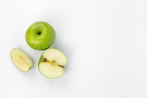 Set of Sliced Fresh Green Apple Isolated on White Background