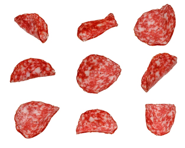 Set of slices of servelat sausage isolated on white background High quality photo