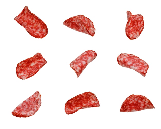 Set of slices of servelat sausage isolated on white background High quality photo