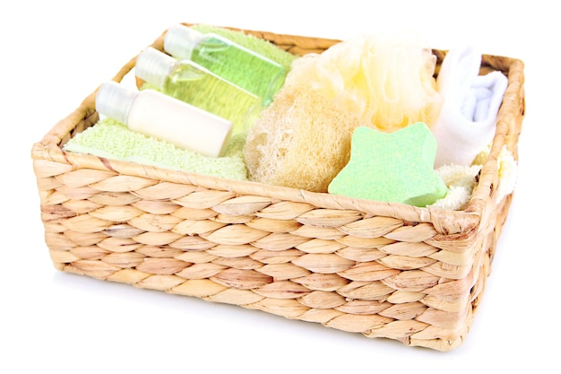 Set for spa in wicker basket isolated on white