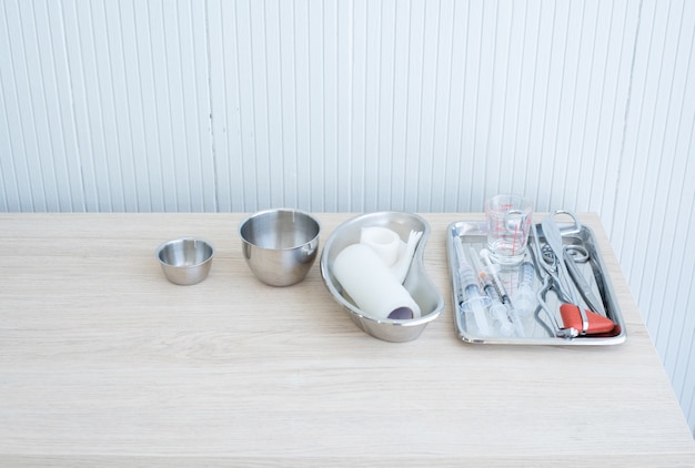 Set of syringe and surgical object on tablet on white background. Medical equipment