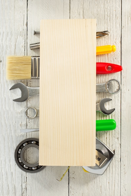 Photo set of tools and instruments on wood