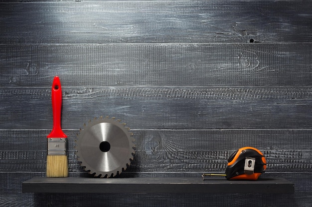 Set of tools and instruments on wooden shelf