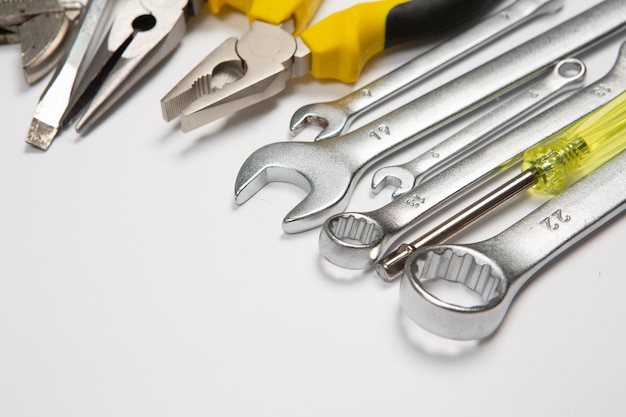 Set of tools for repair in a case on a white background Assorted work or construction tools