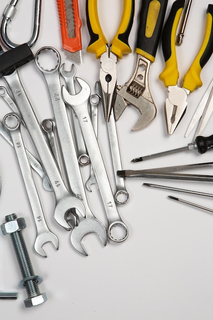 Set of tools for repair in a case on a white background Assorted work or construction tools