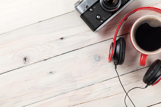 Set of travel stuff Camera headphones and coffee cup