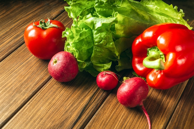 Set of vegetables for a salad diet. Cooking salad in the restaurant kitchen. Free advertising space