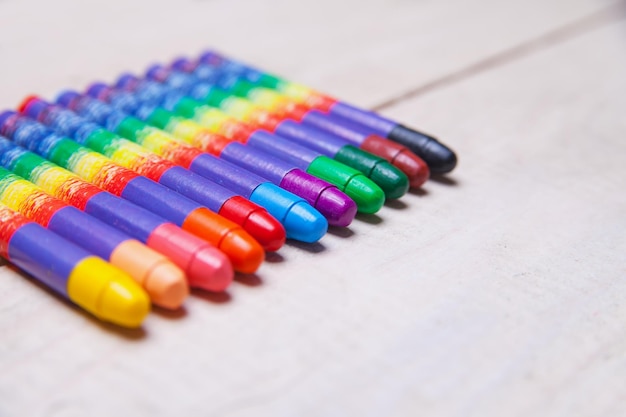 Set of wax crayons on wood table