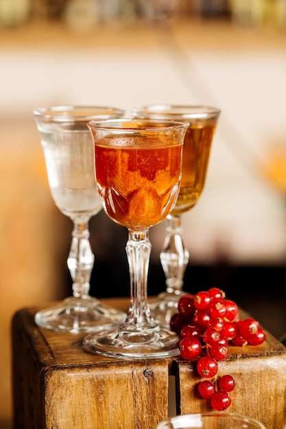 Set with different drinks on interior background