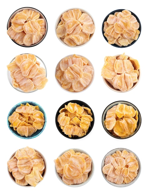 Set with sweet dried jackfruit slices in bowls on white background top view