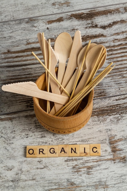 Set of wooden utensil tools and organic word