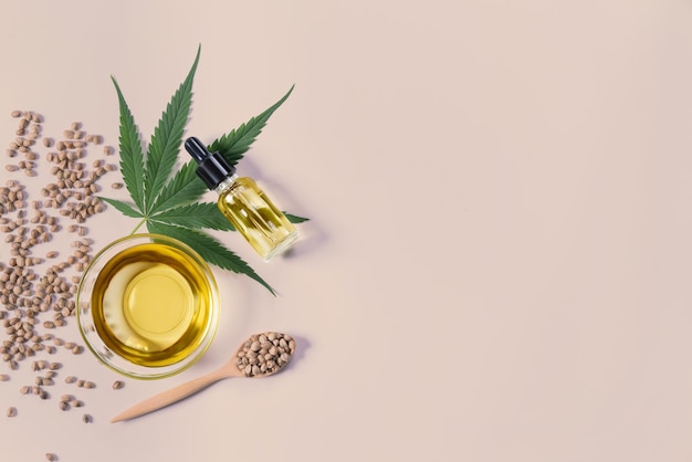 Sets of legalized marijuana features with CBD oil in bottle with dropper lid