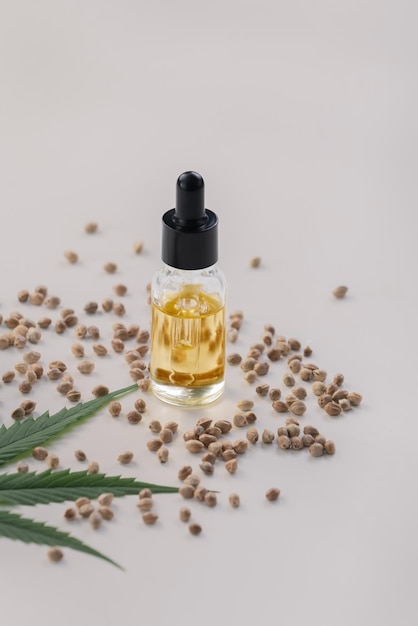 Sets of legalized marijuana features with CBD oil in bottle with dropper lid