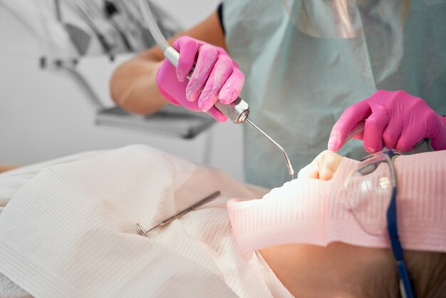 Setting teeth with UV light.