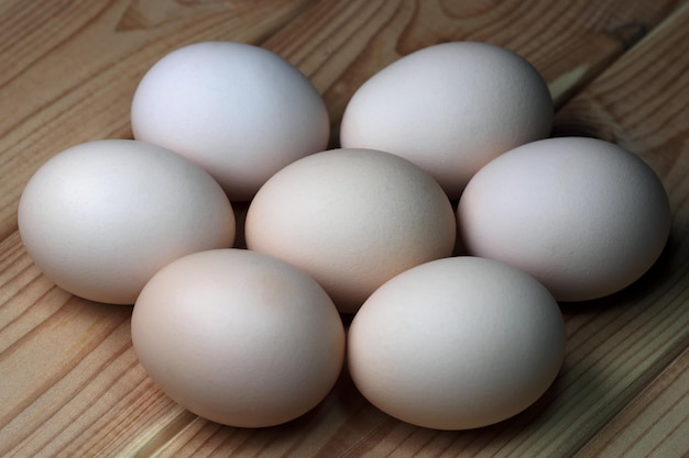 Seven raw chicken eggs