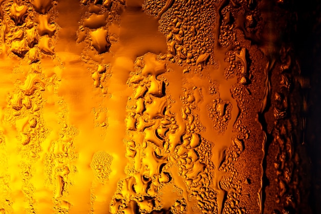 Several beer bottles with condensationClose up of beer bottlesItaly Venezuela