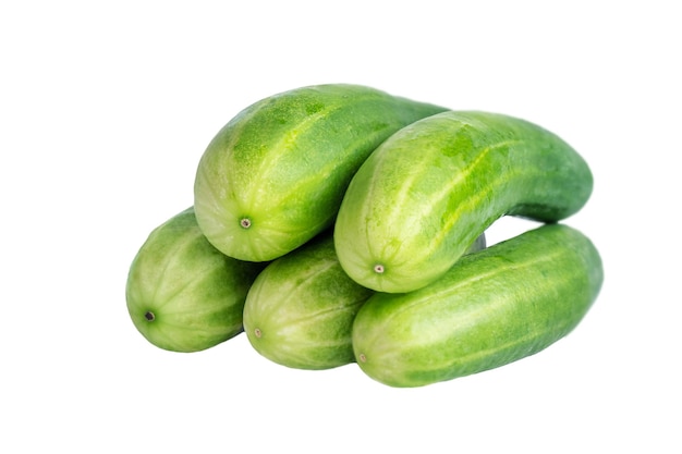 Several cucumbers lie on top of each other isolated