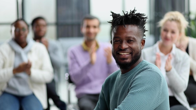 Several ethnic groups share ideas while sitting in an office