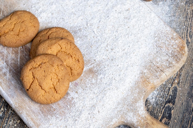 Several round light cookies after cooking