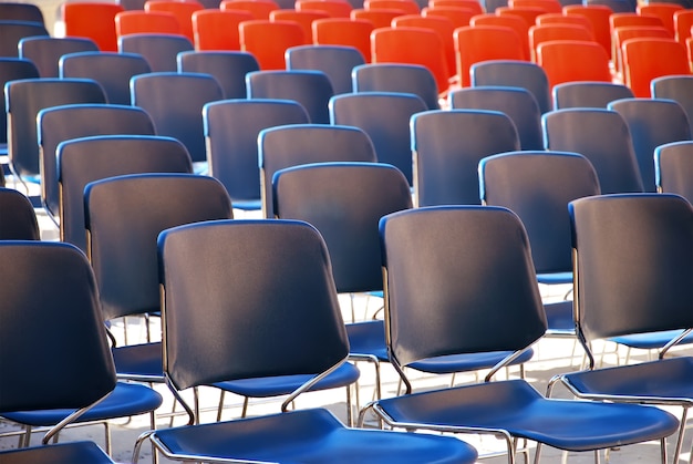 Several rows of plastic chairs