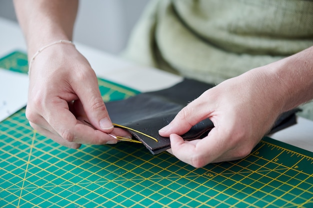 Sewing leather goods