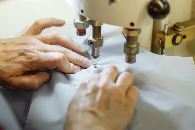 Sewing machine scribbling fabric tailoring at the factory