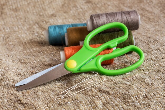 Sewing tools with needles and thread