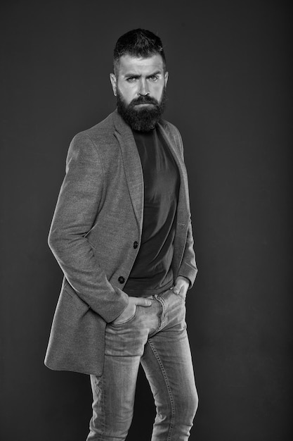 Sexy brutality Mature hipster with beard Confident and handsome Brutal man Hair and beard care Male barber care Bearded man Young and handsome confident and stylish fashion model