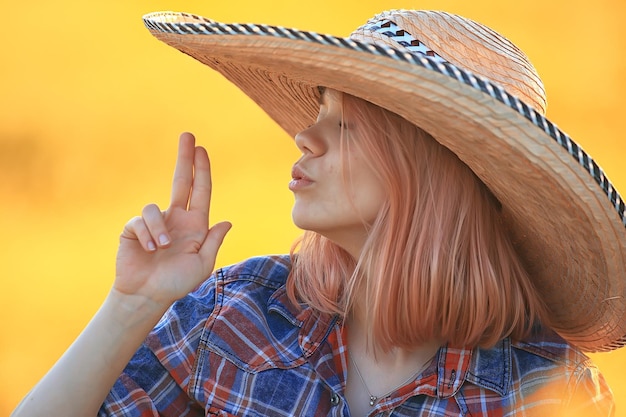 sexy cowboy girl in hat, country style summer american west