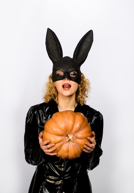 Sexy girl with pumpkin halloween party happy halloween trick or treat october jackolanterns bunny