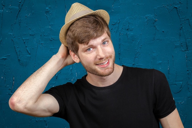 Sexy young man with hat