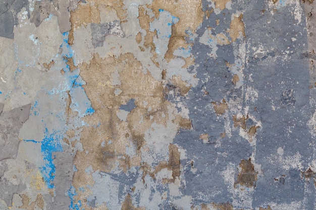 Shabby weathered artistically peeled off blue and gray paint