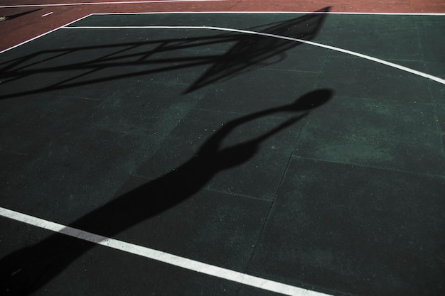 Shadow of basketball player training