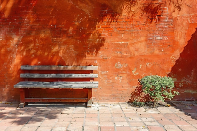 Shadow on the brick wall and bench in the room photo