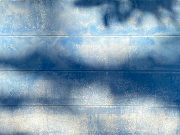 Shadow on old concrete wall background