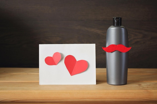 Shampoo with moustache and applique with hearts