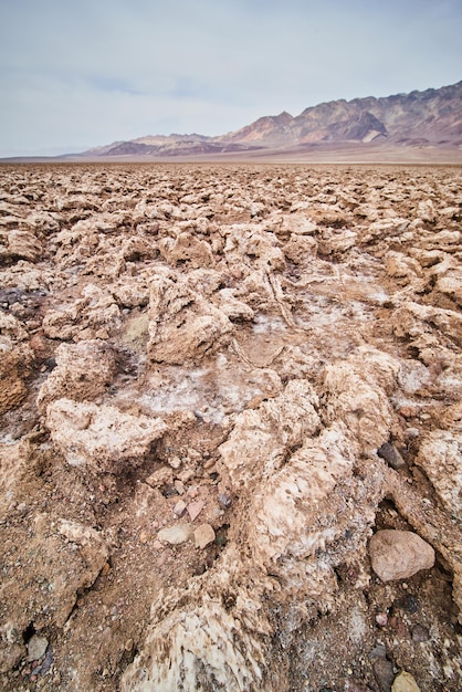 Sharp eroded salt formations in death valley salt flats