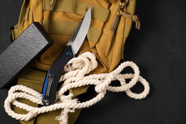 Photo sharp pocketknife on a black background