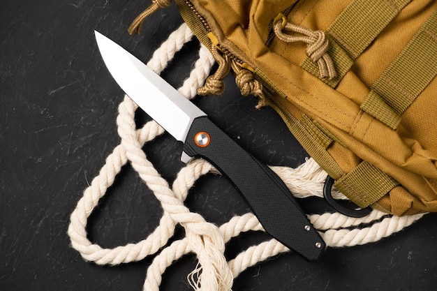 Sharp pocketknife on a black background