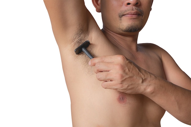 Shaves a man's armpit with a close-up blade 