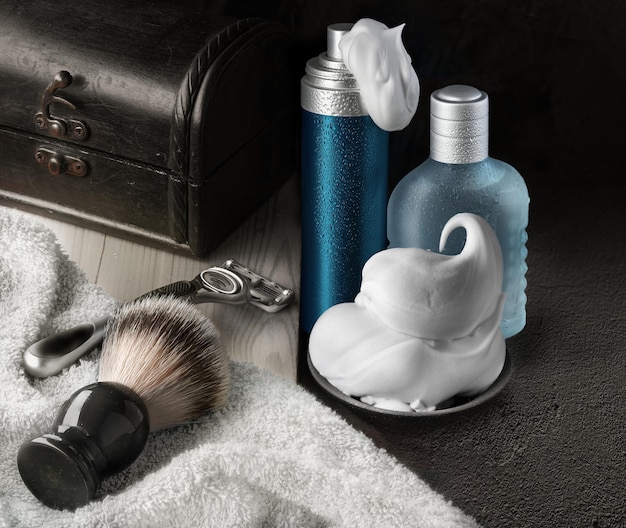 Shaving accessories set on dark background mockup